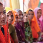 Women discussing priority issues at a village council meeting. (Photo by Ashutosh Negi)