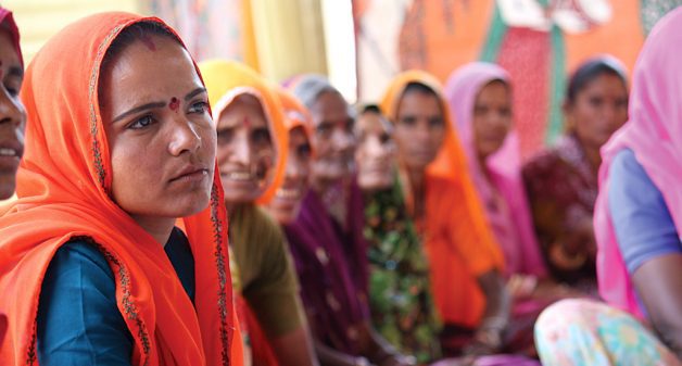 Women discussing priority issues at a village council meeting. (Photo by Ashutosh Negi)