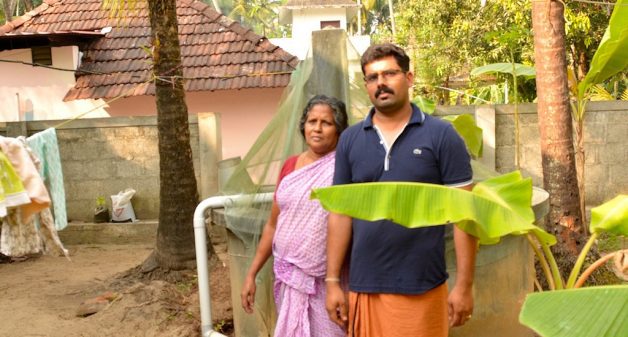 Komalam Ramachandran of Naduvilkara in Thrissur district and her son in front of the well in their house. (Photo by S. Gopikrishna Warrier)