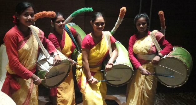 Women have started playing the dhak, a big drum traditionally played only by men.