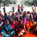 The women of Tarkhutta village holding a meeting. (Photo by Suneeta Dhar)