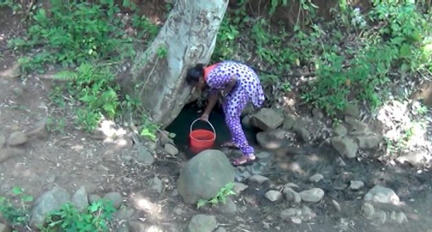 A dirty ditch is the only source of water in Kulappadi village. (Photo by K. Rajendran)