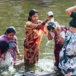 In many villages, an informally decided upon time is kept aside for women taking a bath in a group. (Photo by Adam Cohn)