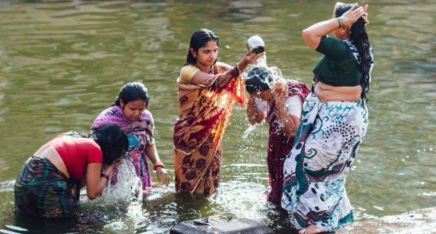 In many villages, an informally decided upon time is kept aside for women taking a bath in a group. (Photo by Adam Cohn)