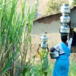 Most rural women still bathe in the open but fetch water to their homes so that their daughters can bathe comfortably. (Photo by Daniel Bachhuber)