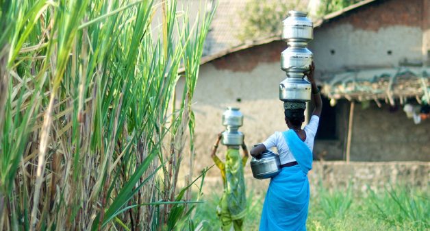 Most rural women still bathe in the open but fetch water to their homes so that their daughters can bathe comfortably. (Photo by Daniel Bachhuber)