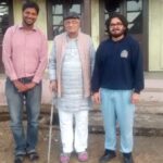Natwarbhai Thakkar (center) with visitors at the Gandhi Ashram in Chuchuyimlang village in Nagaland. (Photo by Ajit Kanitkar)