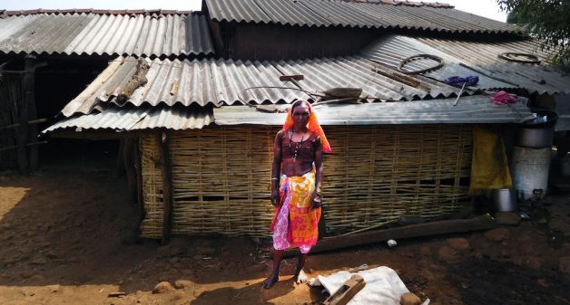 Ulusi Madhu Pawar in front of her hut in Navagam village. (Photo by Gajanan Khergamker)