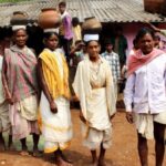 Led by village headman Krusna Kadraka and Dasara Kadraka in an earlier mission to collect lost millet varieties, the women of Kadarguma prepare to walk to their clan families in remote hamlets. (Photo by Manipadma Jena)