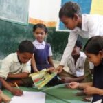 Children issuing books at the Anandghar library in Kajrah village in Balaghat. (Photo by Cosmos Joseph)
