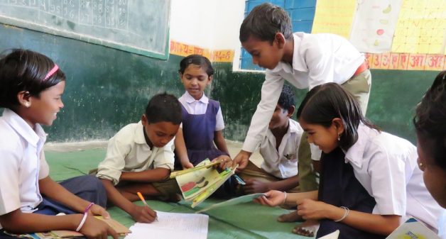 Children issuing books at the Anandghar library in Kajrah village in Balaghat. (Photo by Cosmos Joseph)