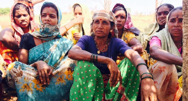 Manjula Ganga Mirki (centered) of Bhetwadi village is confident that the embankment will harvest enough rainwater to last them through the next summer. (Photo by Nidhi Jamwal)