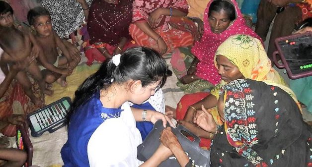Women of Ilami attend night school as a first step towards overall development. (Photo by Chhandosree)