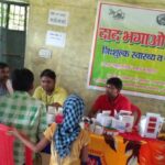 A physician offers consultation during a daad bhagao camp, set up specifically to diagnose and treat skin infections. (Photo by People’s Action for National Integration)