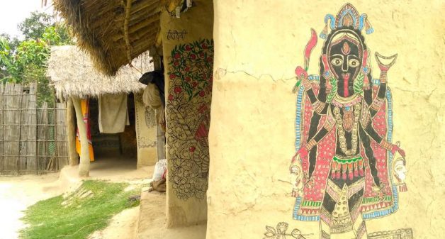 A brightly painted house wall in Jitwarpur village (Photo by Jigyasa Mishra)