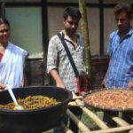 Devanga Saikia in center, guiding Utpola Bora and her husband Binanda Saikia in making pickles in their residence in Nagaon (Photo by Abdul Gani)