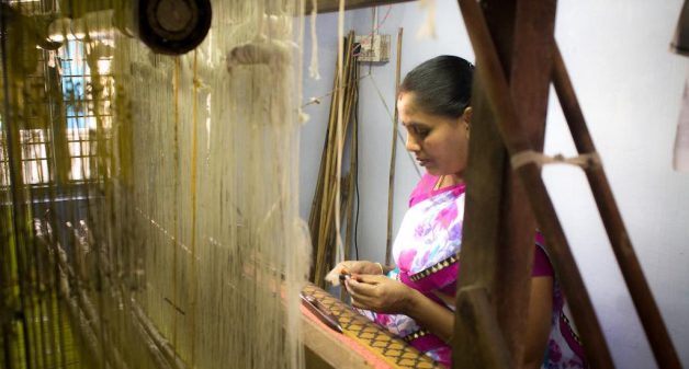 Many young people are moving away from their traditional occupation of weaving cotton sarees on handlooms (Photo by Sharada Balasubramanian)