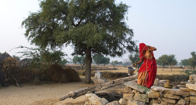 Pulling water from a well without the safety of a wheel and pulley is common across India’s villages (Photo by Knut-Erik Halle)