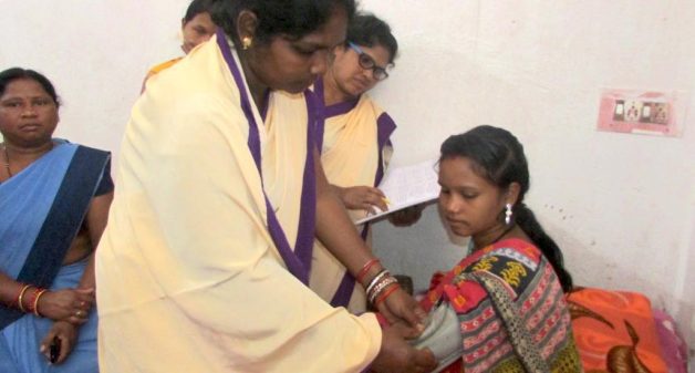 Health assistants check women from remote areas with no access to hospitals staying in the pre-confinement maternity home (Photo by Rakhi Ghosh)