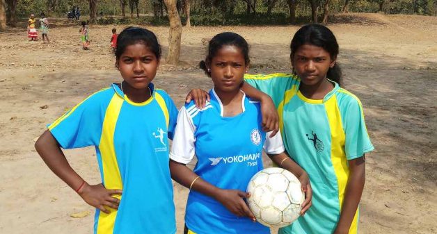 Teenaged Santhal girls Bitti Mardi, Malati Hansda and Arpita Murmu have taken to football, defying traditions and opposition, hopeful of a better future (Photo by Gurvinder Singh)