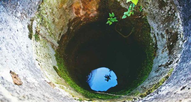 Sourcing drinking water from dug wells have become a rarity in many parts of rural India (Photo by Pixabay)