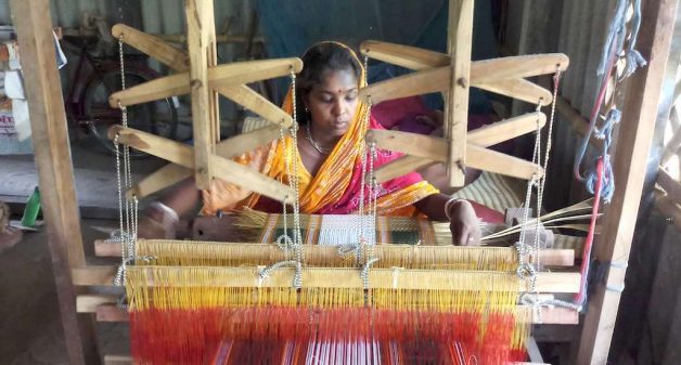 Madur artisans, most of whom are women, use a loom or a bamboo frame to weave the mats (Photo by Gurvinder Singh)