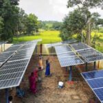 Women in Maligaon carrying out maintenance work at the village’s solar panels. Four such groups have been created to take care of the regular maintenance and upkeep of the powerhouse (Photograph by Ashutosh Bhat)