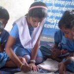 Subhasmita, in addition to convincing parents to send their children to school regularly, helps her classmates and younger children improve their learning (Photo by Rakhi Ghosh)