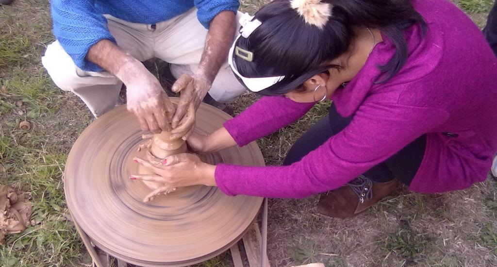 Saima Shafi Mir, seen at a potter's wheel, brings pottery to limelight