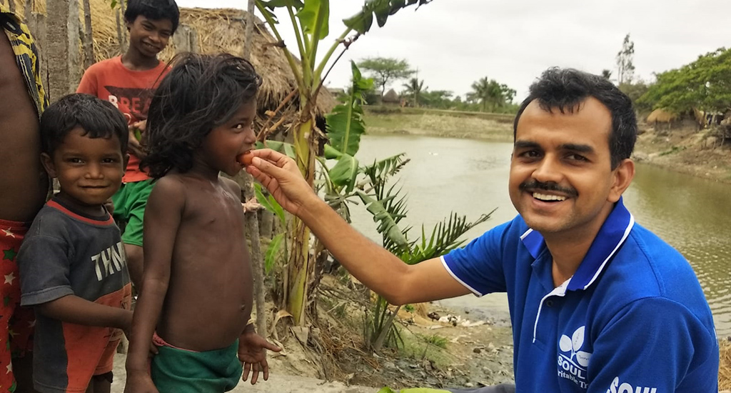 The author with children in G-Plot island