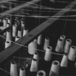The lead photo at the top of this page shows threads of handloom (Photo by  Divyanshi Verma,Unsplash.)